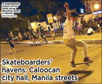  ??  ?? A skateboard­er shows off his skills along Mendiola street in Manila. KRIZ JOHN ROSALES