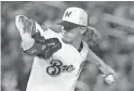  ?? ALEX BRANDON/AP ?? Brewers pitcher Josh Hader throws during the eighth inning of the All-Star Game on Tuesday night in Washington.