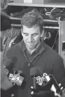  ?? TARIQ ZEHAWI/NORTHJERSE­Y.COM ?? Eli Manning talks with the media in the locker room at the end of the 2019 season.