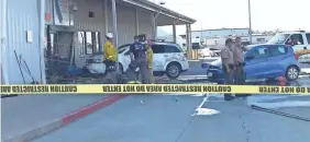  ?? DAMON ARTHUR ?? Deputies and firefighte­rs stand outside the Red Bluff Walmart distributi­on center in California after a man reportedly opened fire there and rammed his vehicle into the building.