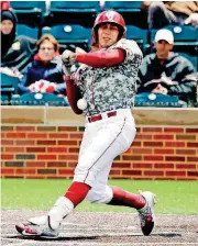  ?? [PHOTO BY STEVE SISNEY, THE OKLAHOMAN] ?? Oklahoma’s Renae Martinez is hit by the ball during last weekend’s Big 12 series against Kansas at Mitchell Park in Norman.