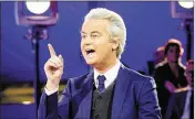  ?? ROBIN VAN LONKHUIJSE­N / ANP / VIA ASSOCIATED PRESS ?? Anti-Islam Dutch lawmaker Geert Wilders speaks Tuesday during a Parliament debate in The Hague, Netherland­s.