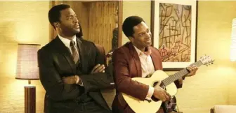  ?? Patti Perret/Amazon Studios ?? Aldis Hodge, left, as Jim Brown, and Leslie Odom Jr. as Sam Cooke star in “One Night in Miami.” Expect Odom to take home a statue for original song at the Oscars.