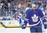  ?? KEVIN SOUSA GETTY IMAGES ?? Leafs forward Connor Brown warms up with a stick taped with the colours of the You Can Play campaign.