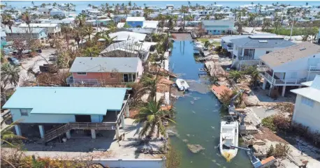  ?? RODNEY WHITE AND MICHAEL ZAMORA, USA TODAY NETWORK ?? It was property not people that took a beating in the Florida Keys because residents got to safety before Hurricane Irma hit.