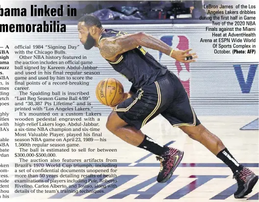  ?? (Photo: AFP) ?? Lebron James of the Los Angeles Lakers dribbles during the first half in Game Two of the 2020 NBA Finals against the Miami Heat at Adventheal­th Arena at ESPN Wide World Of Sports Complex in October.