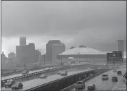  ?? AP/MATTHEW HINTON ?? Rain and heavy clouds move Tuesday into New Orleans ahead of Tropical Storm Gordon.