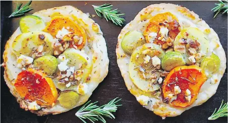  ??  ?? Holiday Vegetable Tarts with yams, sweet potatoes, onions and brussels sprouts are topped with walnuts and goat cheese.