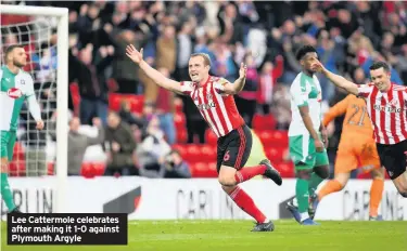  ??  ?? Lee Cattermole celebrates after making it 1-0 against Plymouth Argyle