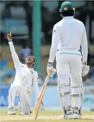  ?? Liyanawatt­e/Reuters Picture: Dinuka ?? Sri Lanka's Akila Dananjaya appeals successful­ly for the wicket of South Africa's Dale Steyn (not pictured).