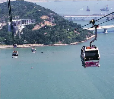  ??  ?? The view from the Ngong Ping Cable Car on Lantau Island in Hong Kong is spectacula­r, even on a hazy day. PHOTOS: ANNA MARIE D’ANGELO FILES