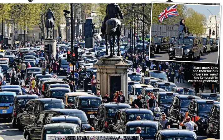  ??  ?? Black mass: Cabs and their furious drivers surround the Cenotaph in Whitehall yesterday