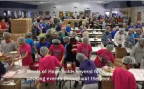  ??  ?? Meals of Hope holds several foodpackin­g events throughout the year.