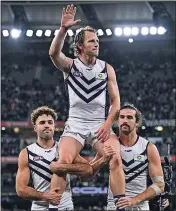  ?? Photo: AAP/James Ross ?? End of a journey: The illustriou­s AFL career of Seymour’s David Mundy came to an end on Saturday night in Fremantle’s semi-final loss to Collingwoo­d.