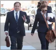  ?? NWA Arkansas Democrat-Gazette/ANDY SHUPE ?? Former state Sen. John Woods (left photo) leaves federal court Wednesday in Fayettevil­le with his attorneys. At right, fellow defendant Randell Shelton Jr. leaves the courthouse. Woods and Shelton are scheduled to go on trial Monday on fraud charges.