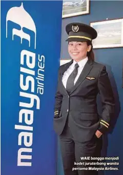  ??  ?? WAIE bangga menjadi kadet juruterban­g wanita pertama Malaysia Airlines.