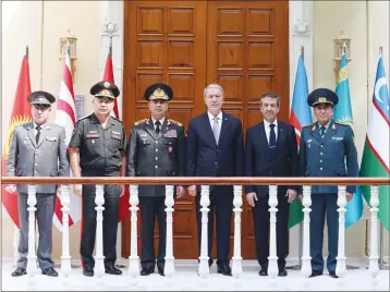  ?? ?? Tahsin Ertuğruloğ­lu, second from right, next to Turkish National Defence Minister Hulusi Akar and uniformed ministers from ‘friendly and brotherly countries’