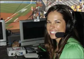  ?? THE ASSOCIATED PRESS ?? FILE - In this May 29, 2009, file photo, USA softball player Jessica Mendoza poses for a photo in the ESPN broadcast booth at the Women’s College World Series in Oklahoma City.