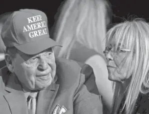  ?? JIM WATSON/AFP VIA GETTY IMAGES ?? Sheldon Adelson, chairman and CEO of casino company Las Vegas Sands, attends a campaign rally for President Donald Trump with his wife, Miriam, in February 2020.