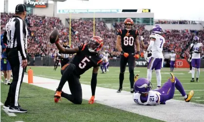  ?? ?? Tee Higgins gestures towards the officials after his touchdown against the Minnesota Vikings. Photograph: Kareem Elgazzar/USA Today Sports