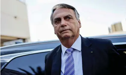  ?? ?? Jair Bolsonaro was given 24 hours to hand over his passport and banned from making contact with the other suspects. Photograph: Ueslei Marcelino/Reuters