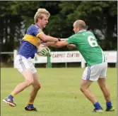  ??  ?? Noel Dempsey of Our Lady’s Island battles with Richard Bent of St Mary’s Rosslare.