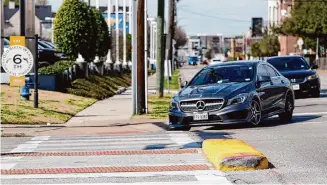  ?? Karen Warren/Staff photograph­er ?? District H Council Member Mario Castillo and other advocates say they were caught off guard by the recent decision to remove a median and curbs installed for pedestrian safety on Houston Avenue.