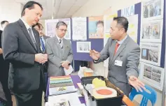 ??  ?? Noor Hisham (left) visits the exhibition booth after launching the Guidelines to Prevent and Handle Violence Against KKM Staff in conjunctio­n with the national celebratio­n of the World Occupation­al Safety and Health Day. — Bernama photo