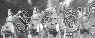  ??  ?? Members of Chai Yun Fai Cultural Troupe performs a Korean-inspired show called ‘The Love of Drums’.