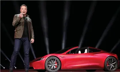  ?? Photograph: Handout/ Reuters ?? Tesla CEO Elon Musk unveils the Roadster 2 during a presentati­on in Hawthorne, California, 16 November 2017.