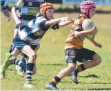  ??  ?? Brothers’ Nicholas Barr lunges to tackle Charters Towers’ Jake Mitchell.