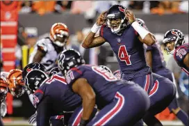  ?? GARY LANDERS / AP ?? Rookie quarterbac­k Deshaun Watson’s first start was successful as the Texans edged the Bengals 13-9 on Thursday night. Watson was Houston’s first-round pick in April. Subscriber­s can check their ePaper for a full report. Watson a winner in first start...