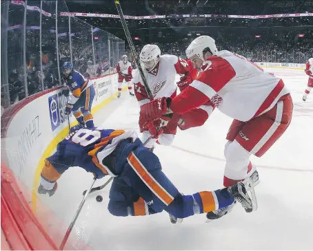  ?? BRUCE BENNETT/GETTY IMAGES FILE ?? Detroit defenceman Jonathan Ericsson, right, has long been known as a physical presence on the Red Wings blue-line, but so far this season, he is much more confident and effective moving the puck.