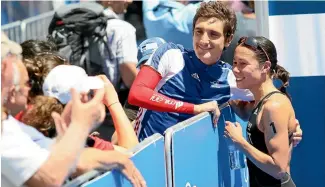  ?? PHOTO: FAIRFAX NZ ?? Andrea Hewitt and Laurent Vidal after Hewitt’s victory in a ITU World Cup triathlon race in Auckland in 2011.