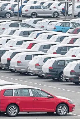  ?? Picture: AP. ?? New Volkswagen vehicles in storage in a car park at the Volkswagen plant in Zwickau, Germany.