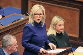  ?? Liam McBurney / Associated Press ?? Sinn Fein vice-president Michelle O'Neill speaks after being appointed Northern Ireland’s first minister, during proceeding­s of the Northern Ireland Assembly in Belfast, Saturday. An Irish nationalis­t has made history by becoming Northern Ireland's first minister.