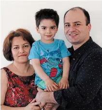  ?? HANDOUT PHOTO THE CANADIAN PRESS ?? Razgar Rahimi, right, his spouse Farideh Gholami and their son Jiwan Rahimi. Family friend Mariana Eret says Gholami was pregnant. The family died aboard the airliner shot down in Iran.