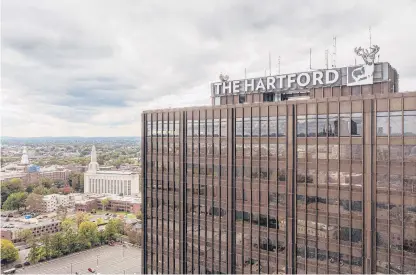  ?? MARK MIRKO/HARTFORD COURANT ?? The Hartford Financial Services Group had planned to bring workers back to the office in a hybrid model beginning Jan. 18.