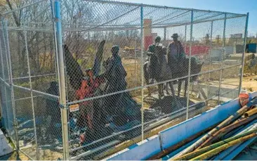  ?? JERRY JACKSON/BALTIMORE SUN ?? Vandals sawed an arm and a scabbard off two Baltimore Confederat­e statues last summer, according to Baltimore’s Commission for Historical and Architectu­ral Preservati­on.