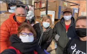  ?? SUBMITTED ?? Kiwanis Club of Greater Euclid members Ken Ferlito, left, Laura Kidder, Tina Dick, Joe Gardner, and Tom Gyure are shown at a clothing drive in December.