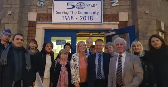  ??  ?? The Russians pictured with Barbara Markey, CEO and Board Directors outside Slane Credit Union.