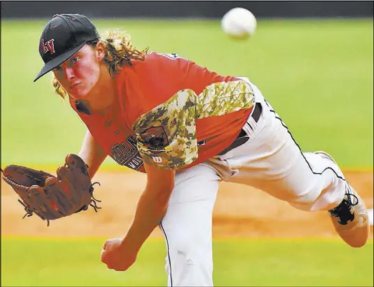  ?? Lucas Carter The American Legion ?? Josh Sharman was the losing pitcher Saturday for Desert Oasis, allowing three unearned runs in 4 2/3 innings against Midland, Mich., in the American Legion World Series at Keeter Stadium in Shelby, N.C.