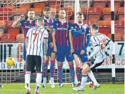  ?? Picture: SNS Group. ?? James Craigen, top, races away to celebrate after firing home Dunfermlin­e’s winning goal.