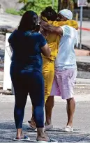  ?? Staff file photo ?? In 2022, a 19-year-old is reunited with her father outside the Migrant Resource Center. The city set up the center to help migrants as they pass through San Antonio.