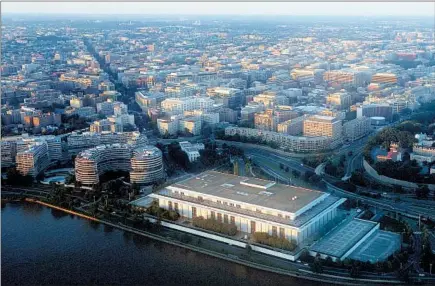  ?? SAUL LOEB/GETTY-AFP ?? The John F. Kennedy Center for the Performing Arts on the banks of the Potomac River, as seen from over Washington, D.C., in 2014.