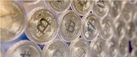  ??  ?? La corsa del Bitcoin.
Nuovo record per la criptovalu­ta
AFP