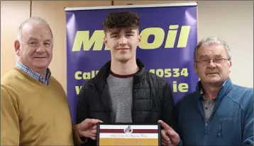  ??  ?? Athlete of the month Ryan Carthy-Walsh of Adamstown – All-Ireland Under-20 and Senior high jump champion – with Seamus Darcy Mr Oil (sponsor) and Paddy Morgan (Athletics Wexford Chairman). Ryan is regarded as the best prospect on the Irish high jumping scene.