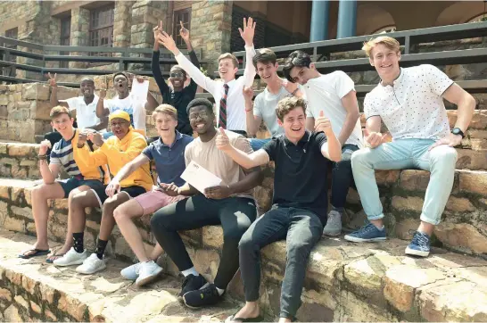  ?? Picture Neil McCartney ?? ALL SMILES. A group of matriculan­ts from St John’s College in Houghton, Johannesbu­rg, celebrate their matric results yesterday.