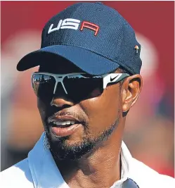  ?? Picture: Getty Images. ?? Tiger Woods: hoping to return to competitiv­e action in December after long lay-off following three operations on his back.