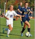  ?? BARRY TAGLIEBER — FOR THE MERCURY ?? Phoenixvil­le’s Leeza Galli, left, tries to dribble past Upper Perkiomen’s Megan Ritting Thursday.